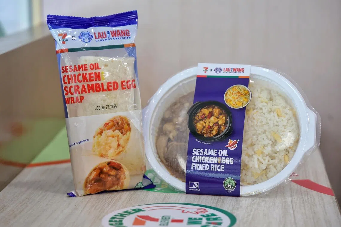 Lau Wang Claypot Delights’ sesame oil chicken scrambled egg wrap and sesame oil chicken egg fried rice, available at selected 7-Eleven outlets until Sept 8.