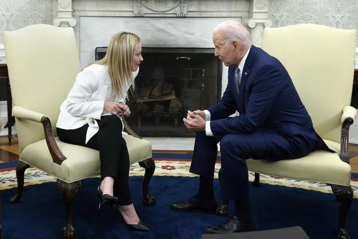 US President Joe Biden (right) with Italian PM Giorgia Meloni in the Oval Office of the White House in Washington, on July 27.