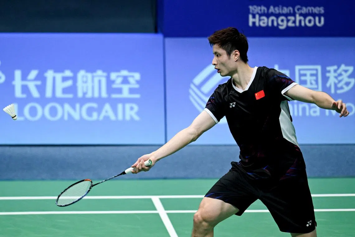 FILE PHOTO: Asian Games - Hangzhou 2022 - Badminton - Binjiang Gymnasium, Hangzhou, China - October 7, 2023 China's Shi Yuqi in action during his Men's Singles final against China's Li Shigeng REUTERS/Weixiang Lim/File Photo