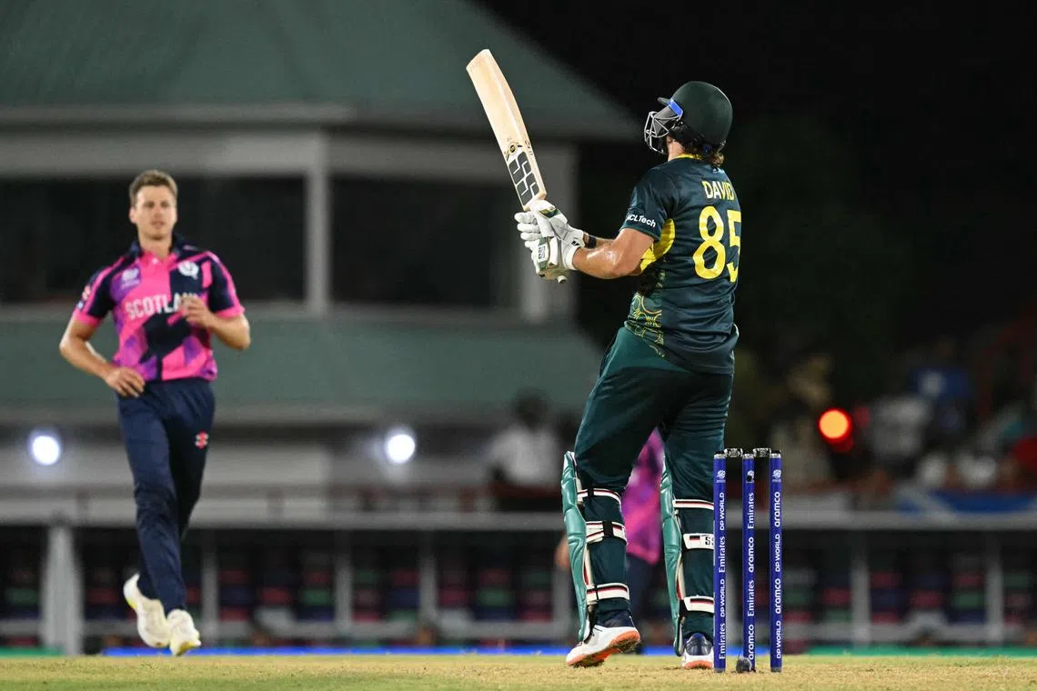 Australia's Tim David hits the winning shot against Scotland in the ICC men's Twenty20 World Cup 2024 group B cricket match at Daren Sammy Cricket Ground in Gros Islet, St. Lucia on June 15, 2024.