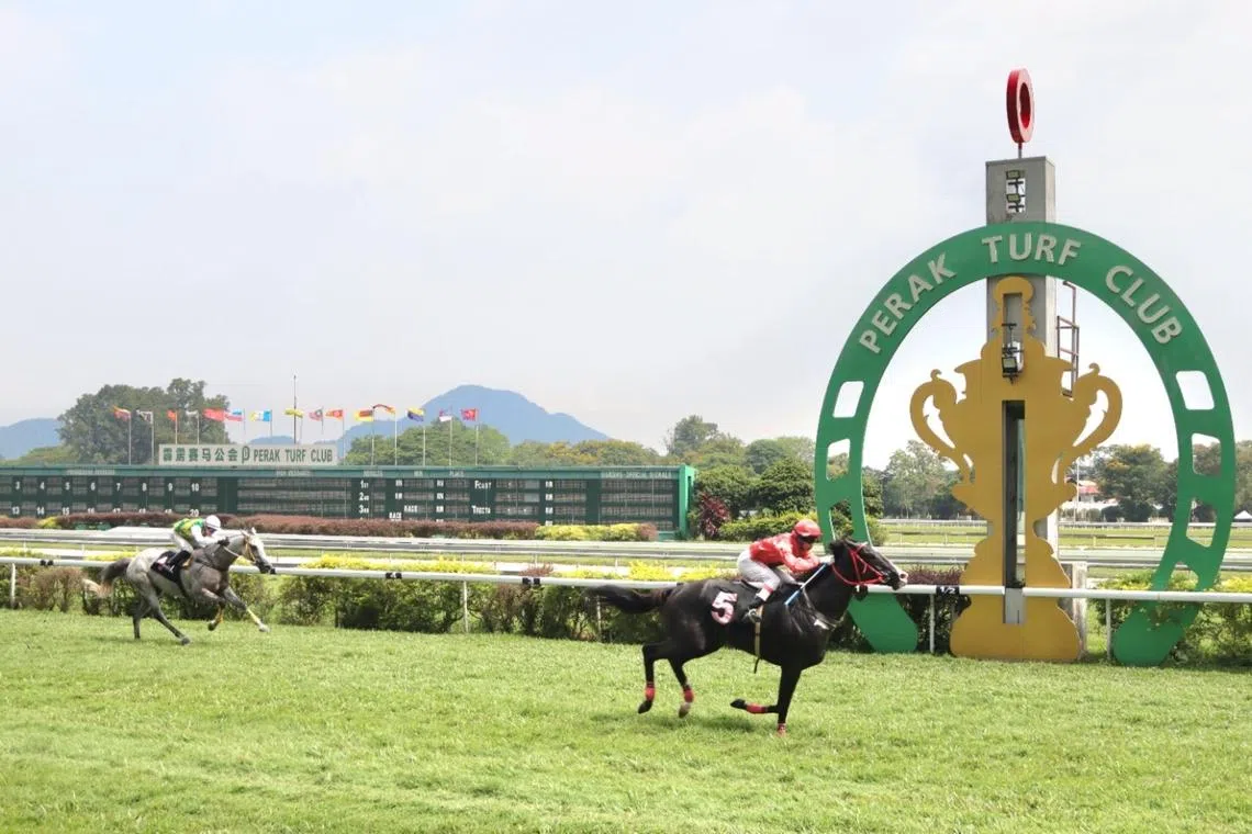 Banker’s double for Johnny Lim