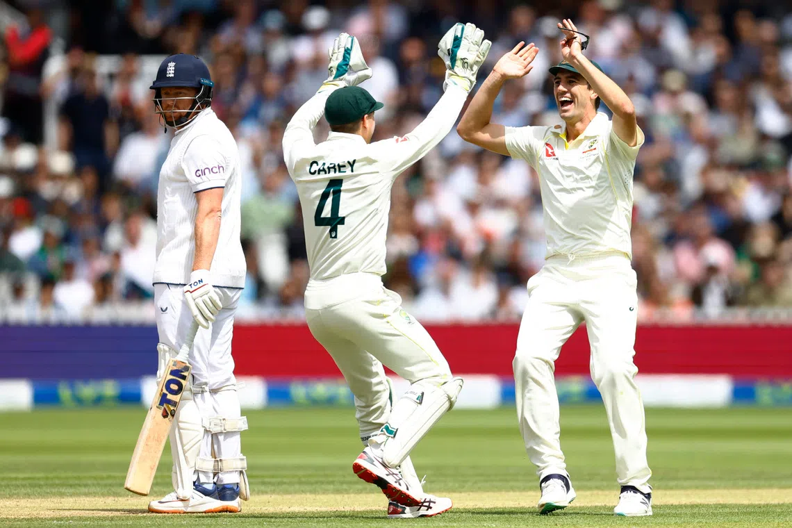 Cricket - Ashes - Second Test - England v Australia - Lords, London, Britain - July 2, 2023 Australia's Alex Carey celebrates with Pat Cummins after running out England's Jonny Bairstow Action Images via Reuters/Peter Cziborra/ File Photo
