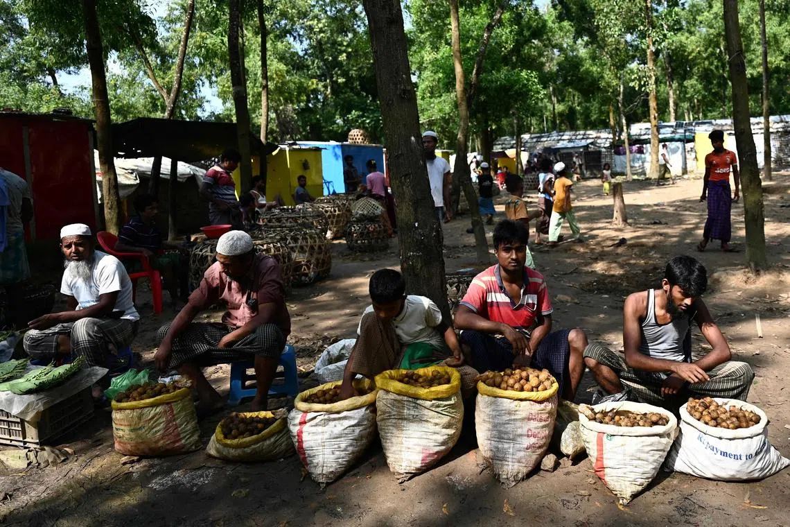 Rohingya refugees selling betel nut in a refugee camp in Bangladesh. A total of 112 people, including a dozen children, were arrested by Myanmar authorities.