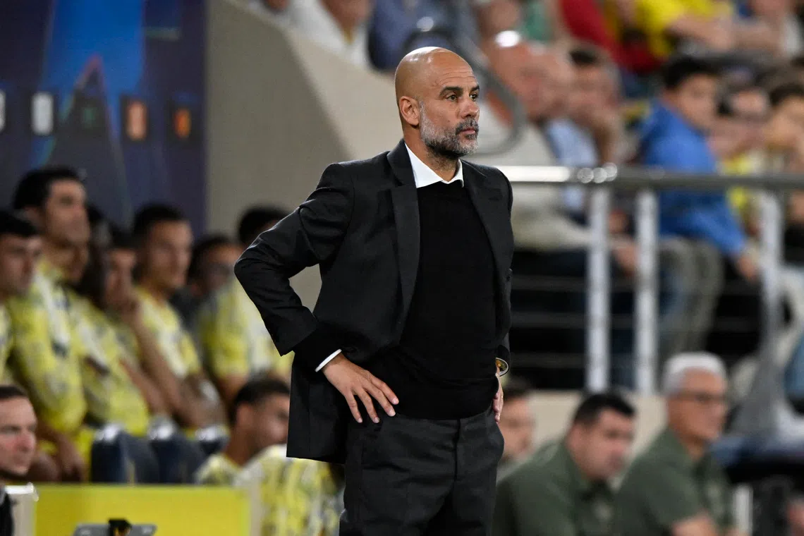 Soccer Football - UEFA Champions League - Villarreal v Manchester City - Estadio de la Ceramica, Villarreal, Spain - October 21, 2025 Manchester City manager Pep Guardiola looks on REUTERS/Pablo Morano