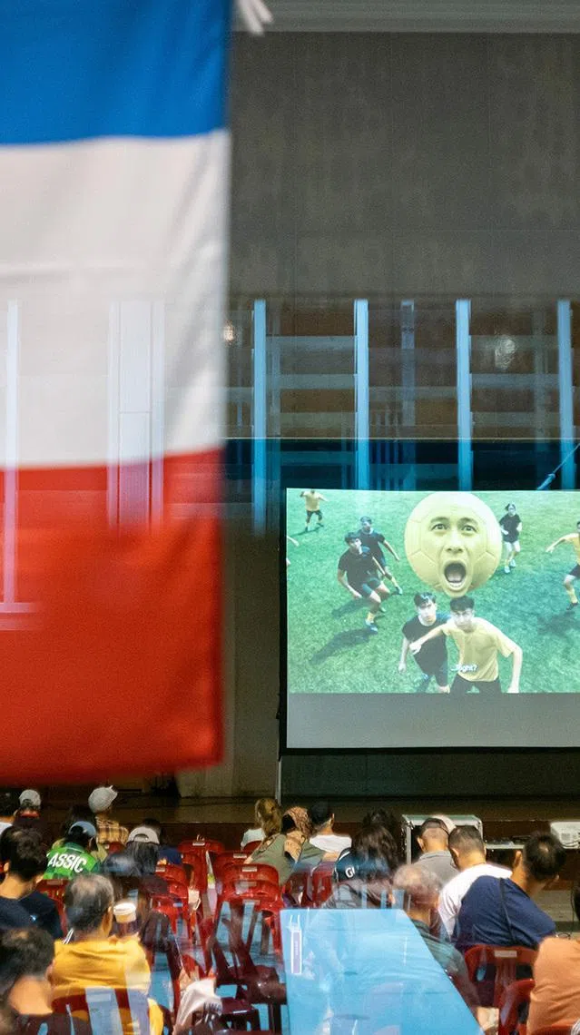 Commercials being played during the half-time of the FIFA World Cup 2026 quaterfinals match between France and Morocco at Bukit Timah Community Club in the wee hours of the morning on July 10, 2026. ST PHOTO: BRIAN TEO