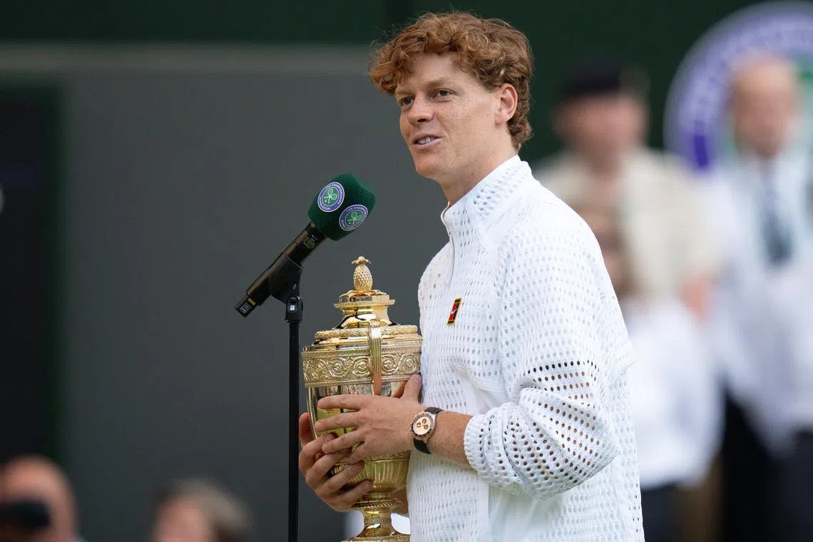 Jul 12, 2026; London, United Kingdom; Jannik Sinner of Italy at the on court interview after winning the men’s singles final against Alexander Zverev of Germany on day 14 at All England Lawn Tennis and Croquet Club.  Mandatory Credit: Susan Mullane-Imagn Images