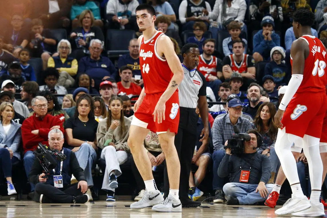 Nov 17, 2024; Memphis, Tennessee, USA; Memphis Grizzlies center Zach Edey (14) limps off the court during the second half against the Denver Nuggets at FedExForum. Mandatory Credit: Petre Thomas-Imagn Images