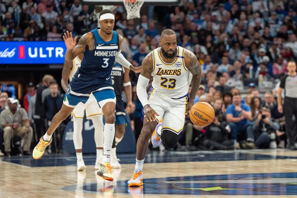 Los Angeles Lakers forward LeBron James chases the ball as a result of the defence of Minnesota Timberwolves forward Jaden McDaniels in the third quarter during Game 4.