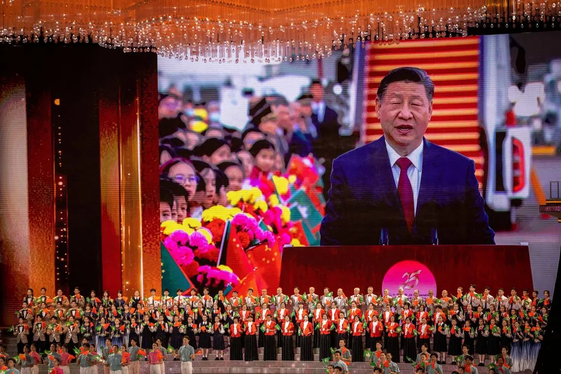 An image of China's President Xi Jinping is displayed on a screen during the \"Macao Sings With Joy For The Future\" cultural soiree in Macau, China December 19, 2024. Eduardo Leal/Pool via REUTERS