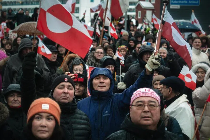 Crowds in Nuk waving the flag of Greenland in protest against President Donald Trump's takeover ambitions, the pursuit of which is threatening to unravel NATO.  