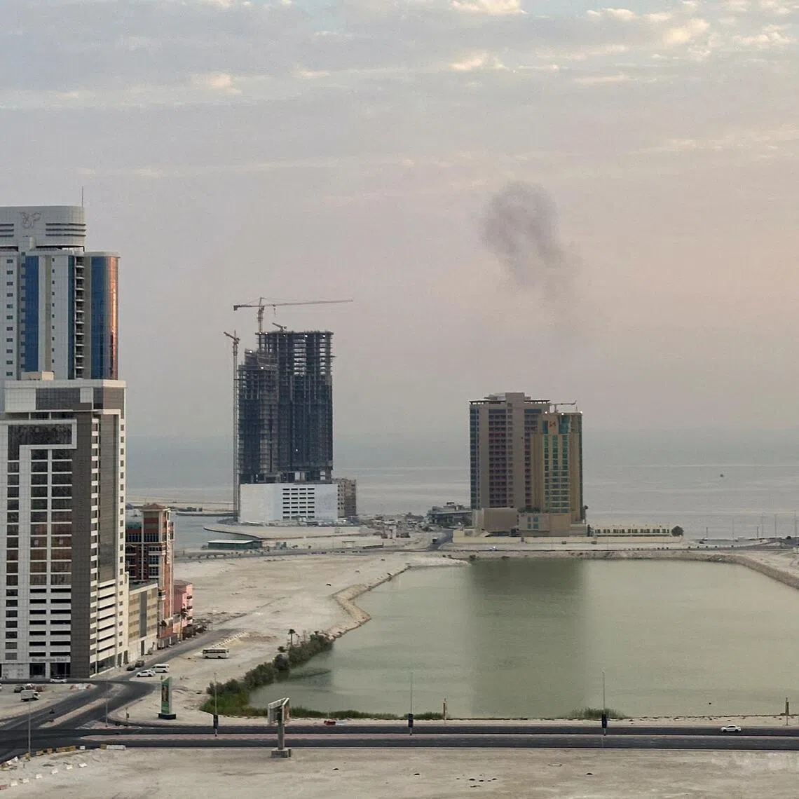 Smoke rises after a drone was intercepted during early morning hours in Manama, Bahrain, on July 14.