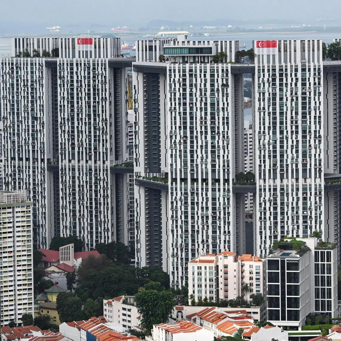 The couple’s Pinnacle@Duxton (left) unit was worth $1.24 million, according to a valuation report in July 2025 accepted by the court.