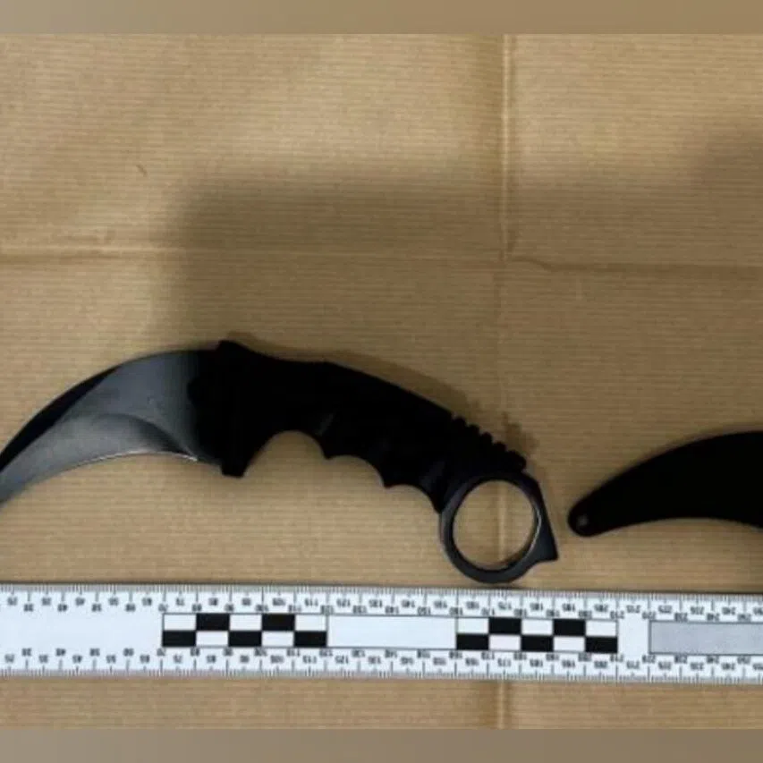 The police seized a mobile phone, gold ring, and a karambit as case exhibits.