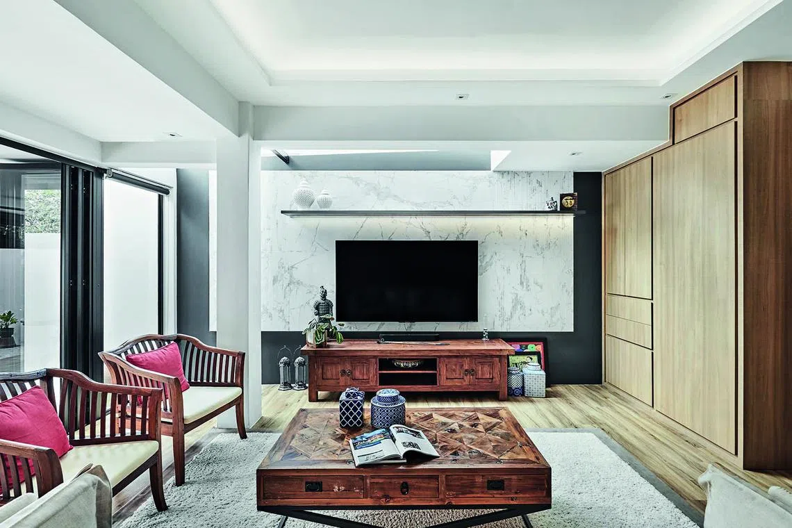 Soft furnishings and well-chosen accessories add colour and detail to the living area.