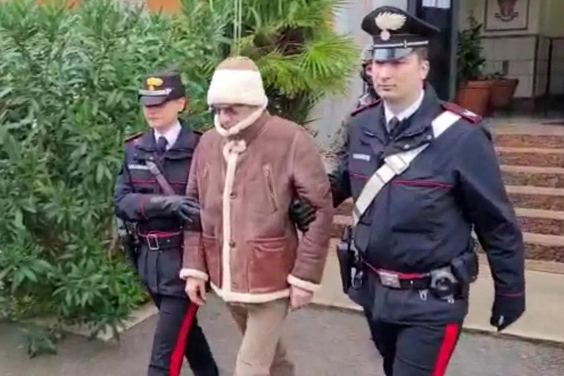 Matteo Messina Denaro being escorted out of a Carabinieri police station after he was arrested in Palermo, Italy, on Jan 16, 2023. 