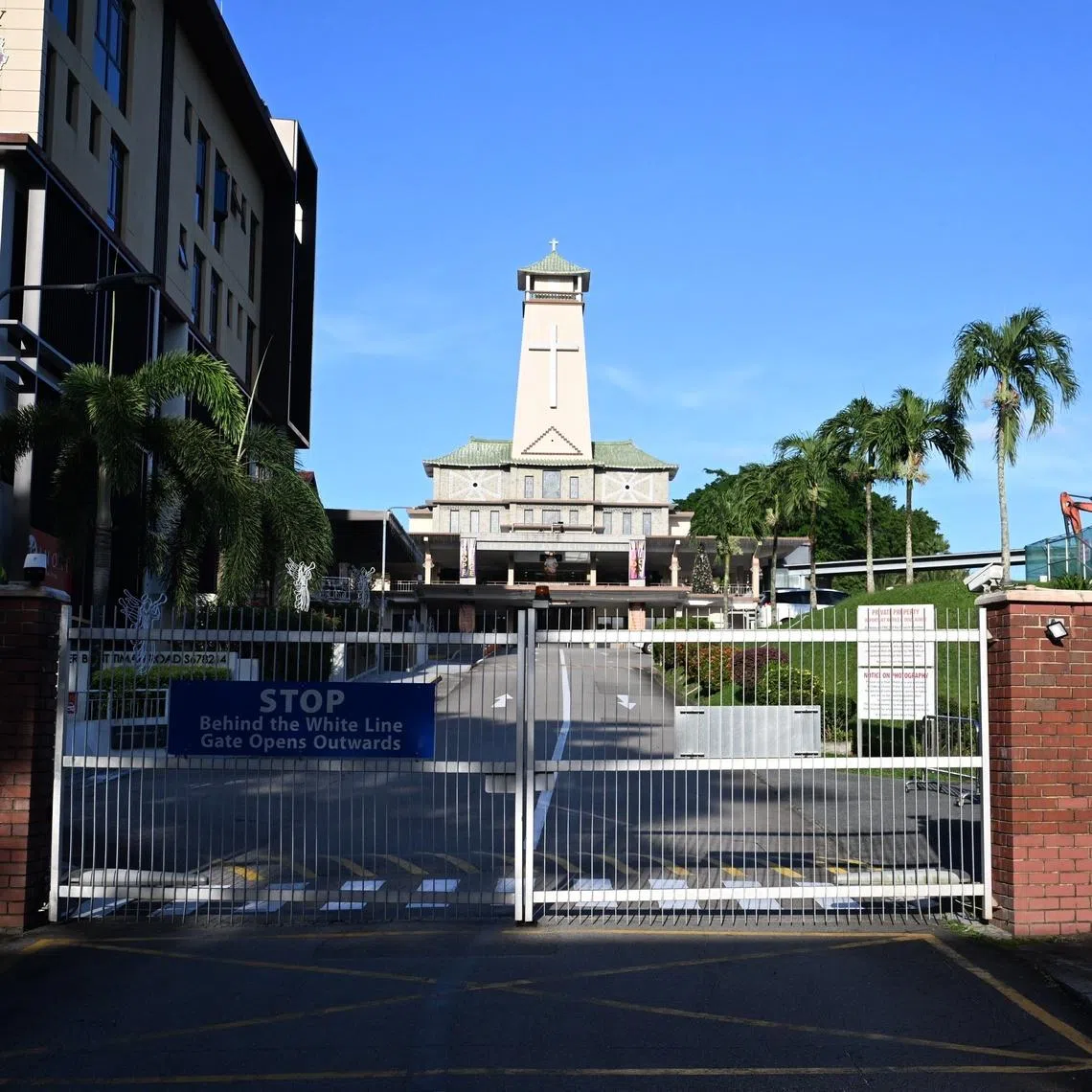 A priest at St Joseph’s Church (pictured) in Upper Bukit Timah was stabbed with a knife while conducting communion in November 2024.
