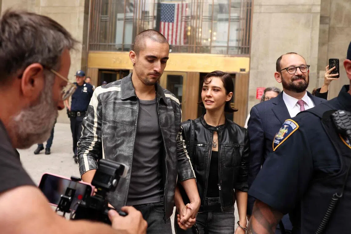 Ivan Kuznetsov and Angelina Nikolau leaving a court hearing in New York on Aug 24.