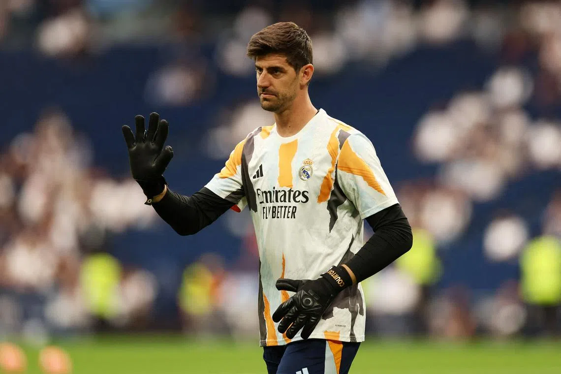 FILE PHOTO: Soccer Football - LaLiga - Real Madrid v Real Sociedad - Santiago Bernabeu, Madrid, Spain - May 24, 2025 Real Madrid' Thibaut Courtois during the warm up before the match REUTERS/Isabel Infantes/File Photo