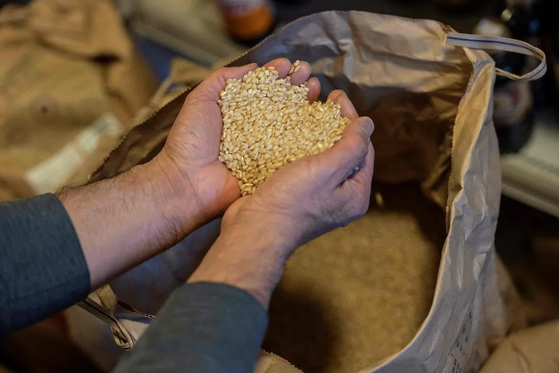 The higher cost of food is forcing people in Japan to scrimp and bargain hunt as their purchasing power drops. 