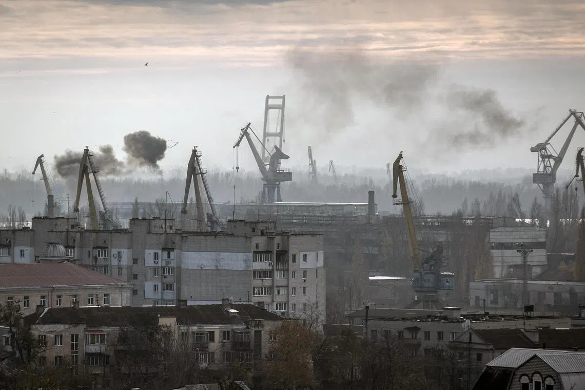 Smoke rising during a Russian attack on the Ukrainian port of Kherson, on the Black Sea coast, on Nov 23, 2022. 