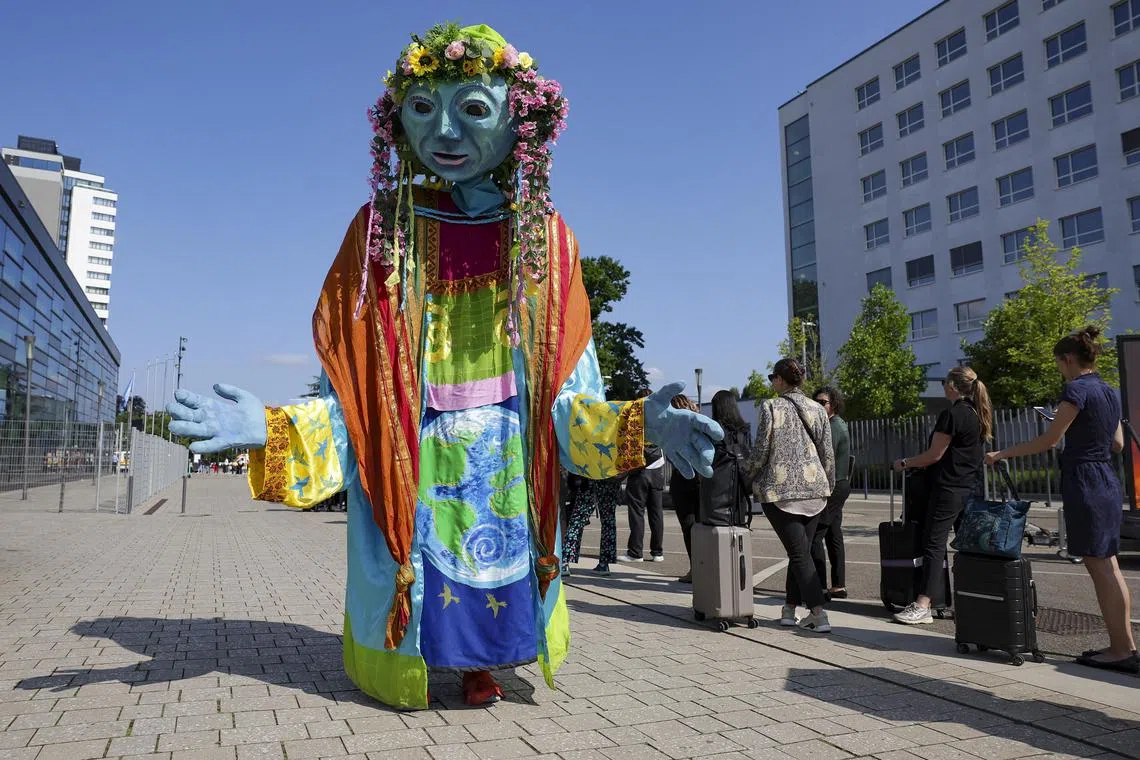 Climate activists protesting in front of the Climate Change Conference in Bonn, Germany, on June 16.