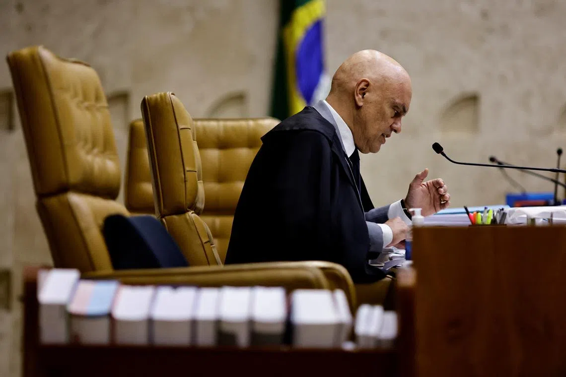 FILE PHOTO: Judge Alexandre de Moraes speaks during session of trial for the storming of government buildings in the capital Brasilia on January 8, 2023 at the Supreme Court, in Brasilia, Brazil September 14, 2023. REUTERS/Ueslei Marcelino/File Photo