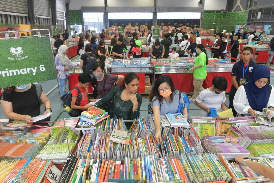 FairPrice Group's Share-A-Textbook drive, seen here in 2022, provides disadvantaged children with educational essentials for the new school year.