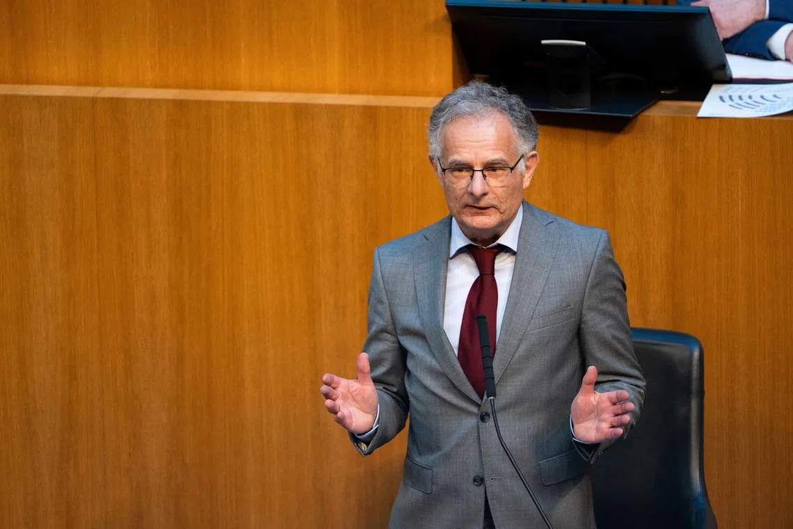 Austrian Finance Minister Markus Marterbauer delivers a speech during a session of the parliament in Vienna, Austria March 26, 2025. REUTERS/Elisabeth Mandl
