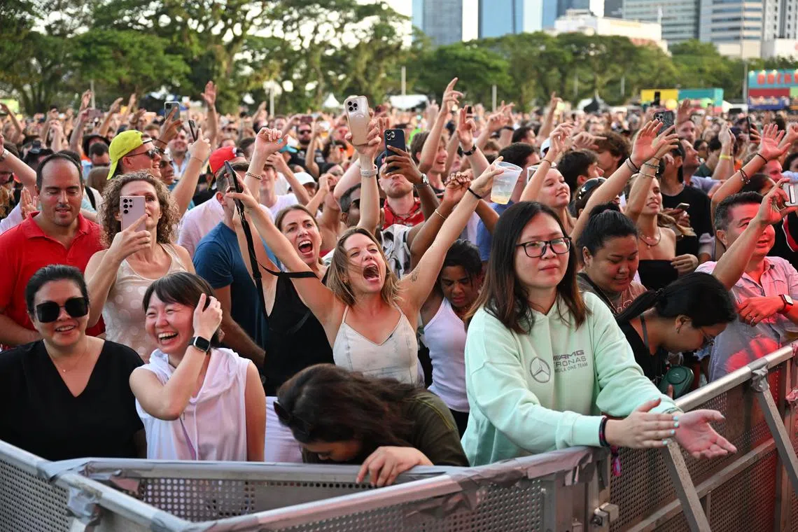 Fans of British dance music duo, Groove Armada cheering as they perform a DJ set on Sep 17, the third and final night of the Formula 1 Singapore Airlines Singapore Grand Prix 2023.