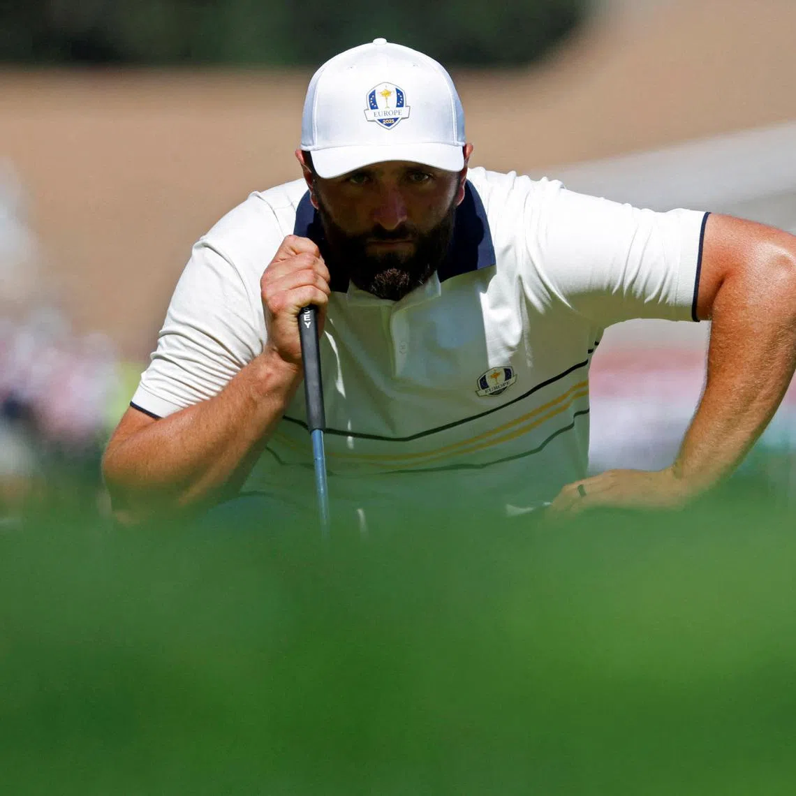 FILE PHOTO: Golf - The 2025 Ryder Cup - Bethpage Black Golf Course, Farmingdale, New York, United States - September 28, 2025 Team Europe's Jon Rahm eyes up his putt on the 3rd hole during the singles IMAGN IMAGES via Reuters/Peter Casey/File Photo
