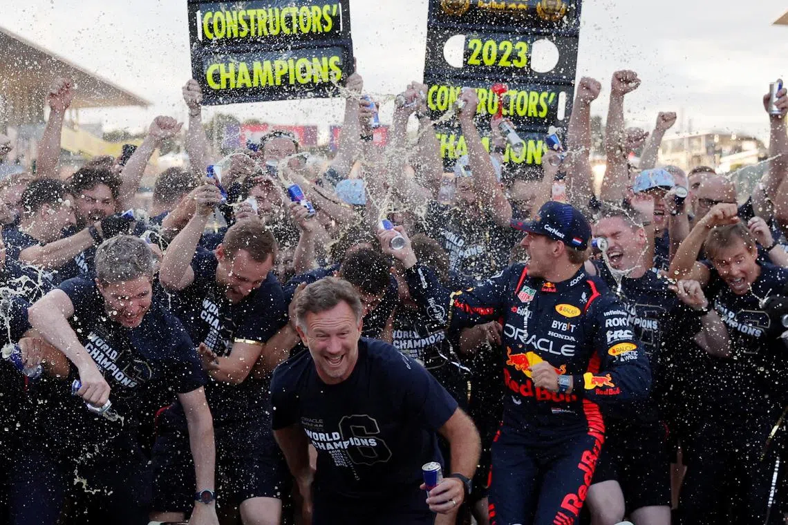 Formula One F1 - Japanese Grand Prix - Suzuka Circuit, Suzuka, Japan - September 24, 2023
Red Bull's Max Verstappen and team principal Christian Hornet celebrate after winning the constructors championship with teammates REUTERS/Issei Kato     TPX IMAGES OF THE DAY     
