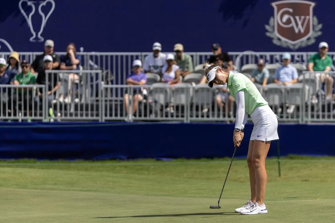 Nelly Korda putts on the 18th green during the first round of The Chevron Championship.