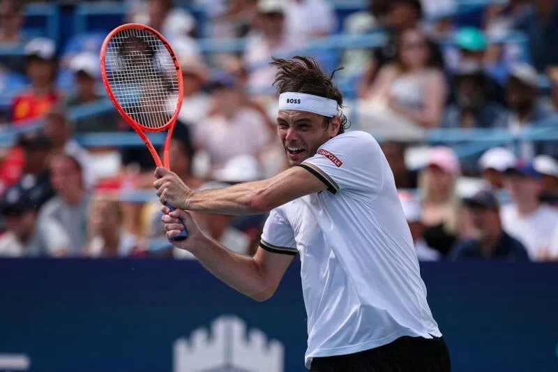 Taylor Fritz of the US returns a shot against Rafael Jodar of Spain in the men’s singles championship match in Washington DC on Aug 3.