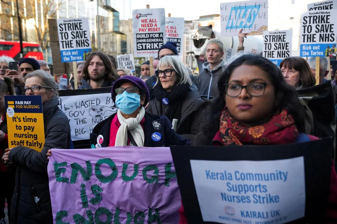 Nurses strike outside University College Hospital in London, Britain, on Dec 20, 2022.