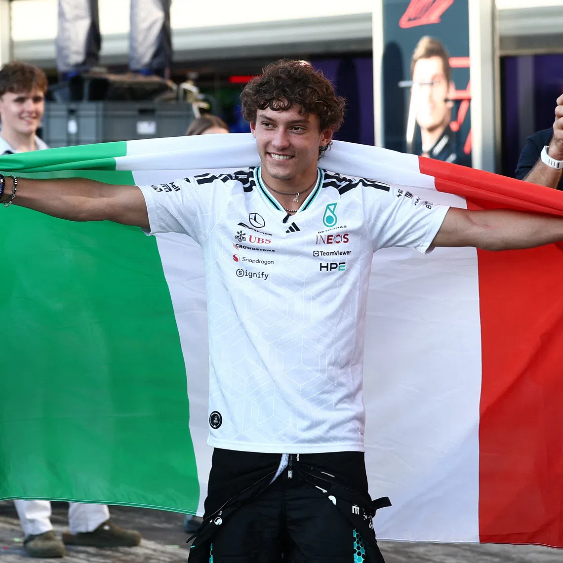 Formula One F1 - Italian Grand Prix - Autodromo Nazionale Monza, Monza, Italy - September 6, 2026 Mercedes' Andrea Kimi Antonelli celebrates with fans and his team after winning the race REUTERS/Guglielmo Mangiapane