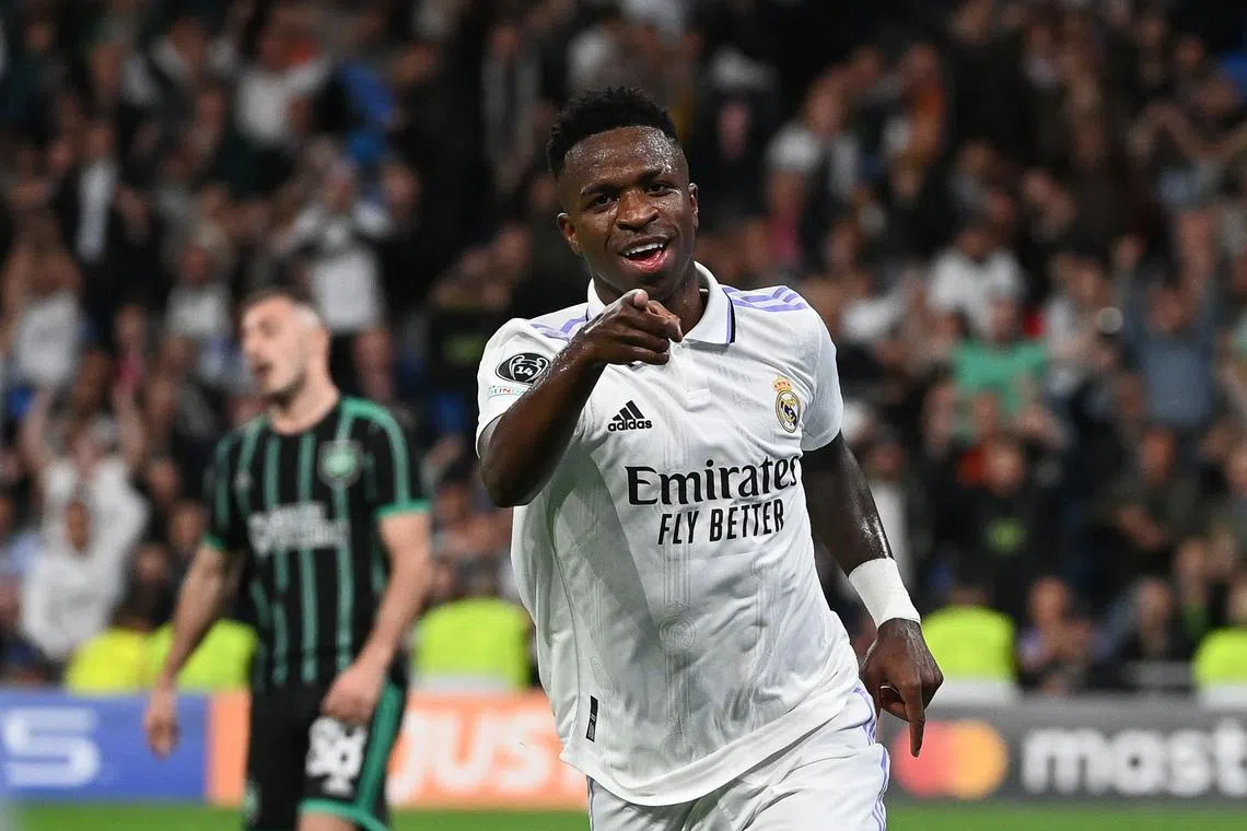 Real Madrid's Brazilian forward Vinicius Junior celebrates after scoring his team's fourth goal.