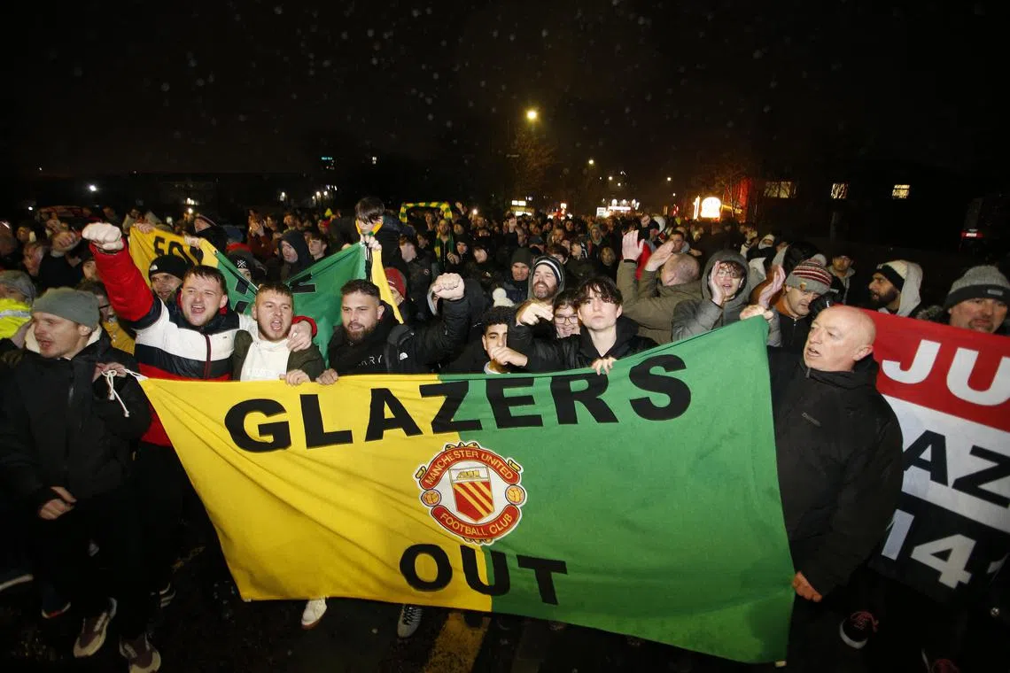 Manchester United fans protest against the Glazer family’s ownership of the club outside the stadium before the club's league match with Nottingham Forest.