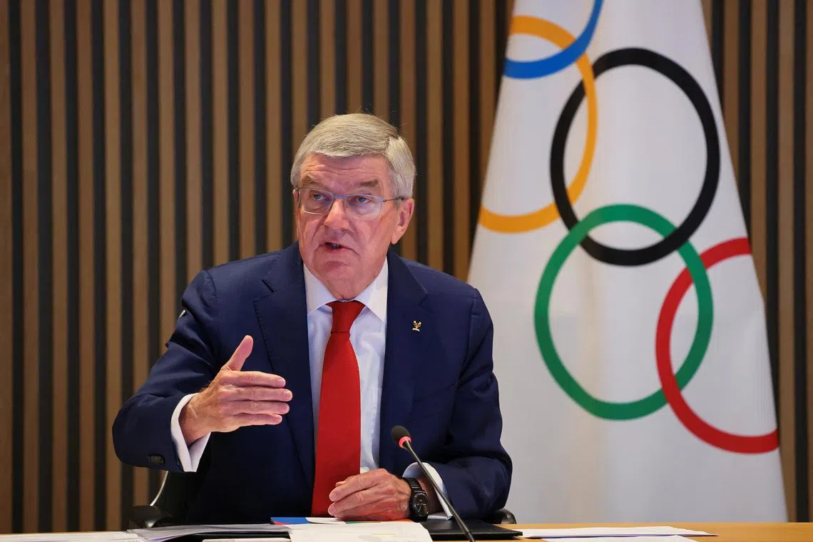 FILE PHOTO: International Olympic Committee (IOC) President Thomas Bach speaks during the opening of the Executive Board meeting at the Olympic House in Lausanne, Switzerland, December 3, 2024. REUTERS/Denis Balibouse/File Photo