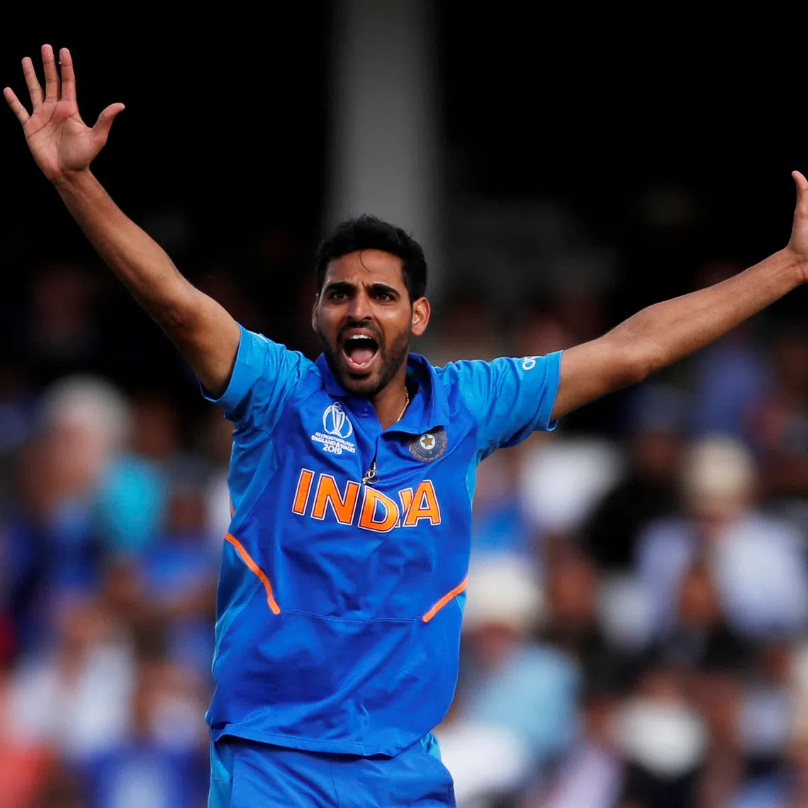 FILE PHOTO: Cricket - ICC Cricket World Cup - India v Australia - The Oval, London, Britain - June 9, 2019    India's Bhuvneshwar Kumar celebrates taking the wicket of Australia's Steve Smith    Action Images via Reuters/Paul Childs/File Photo