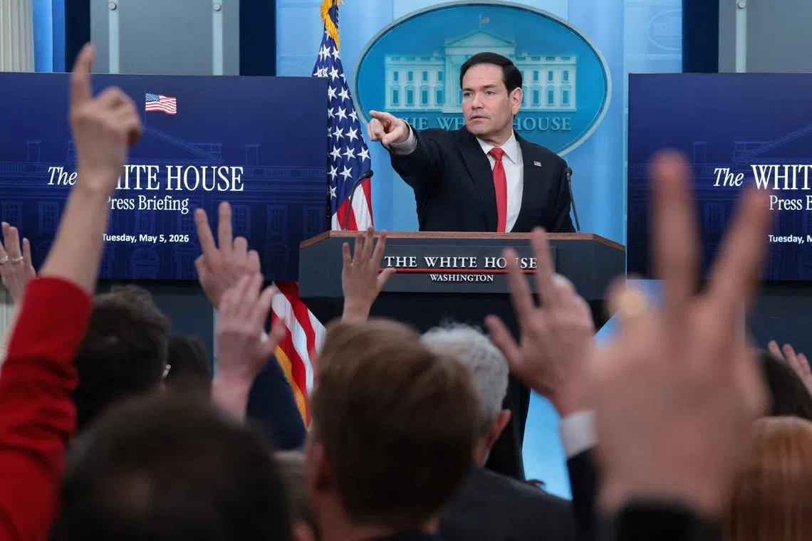 U.S. Secretary of State Marco Rubio points as members of the media raise their hands during a press briefing in the James S. Brady Press Briefing Room at the White House in Washington, D.C., U.S., May 5, 2026. REUTERS/Kylie Cooper