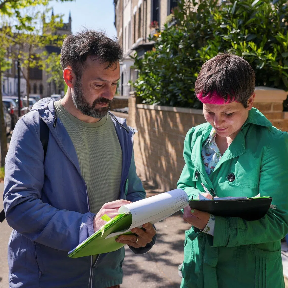 Green Party candidate for London mayor Zoe Garbett canvasses in London, Britain April 22, 2026. REUTERS/Marissa Davison