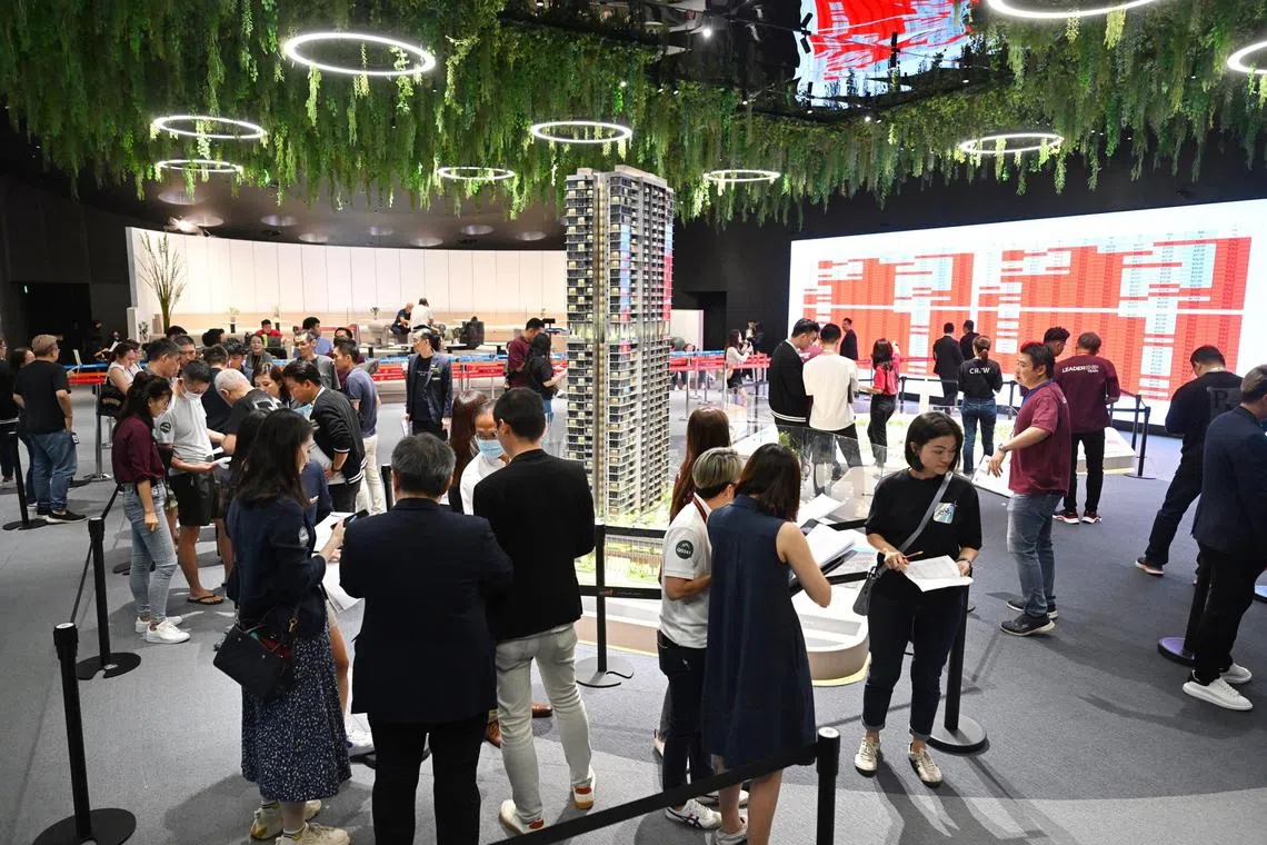 Potential buyers of J’den, a 99-year leasehold mixed-use development on the site of the former JCube mall, at its launch on November 11. 

ST PHOTO: AZMI ATHNI