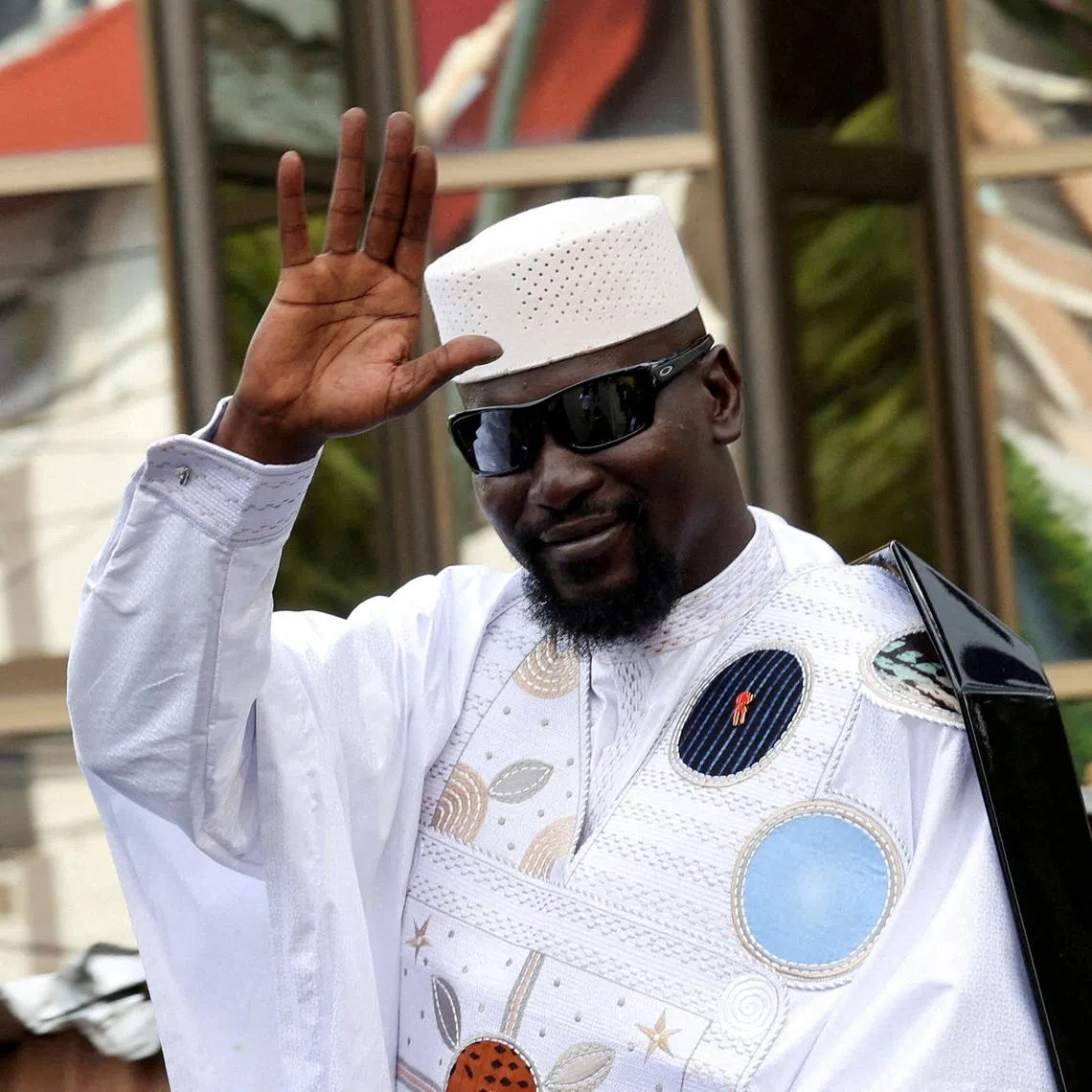 FILE PHOTO: Guinean leader Mamadi Doumbouya waves after submitting his candidacy at the Supreme Court ahead of the presidential election, in Conakry, Guinea, November 3, 2025. REUTERS/Luc Gnago/File Photo