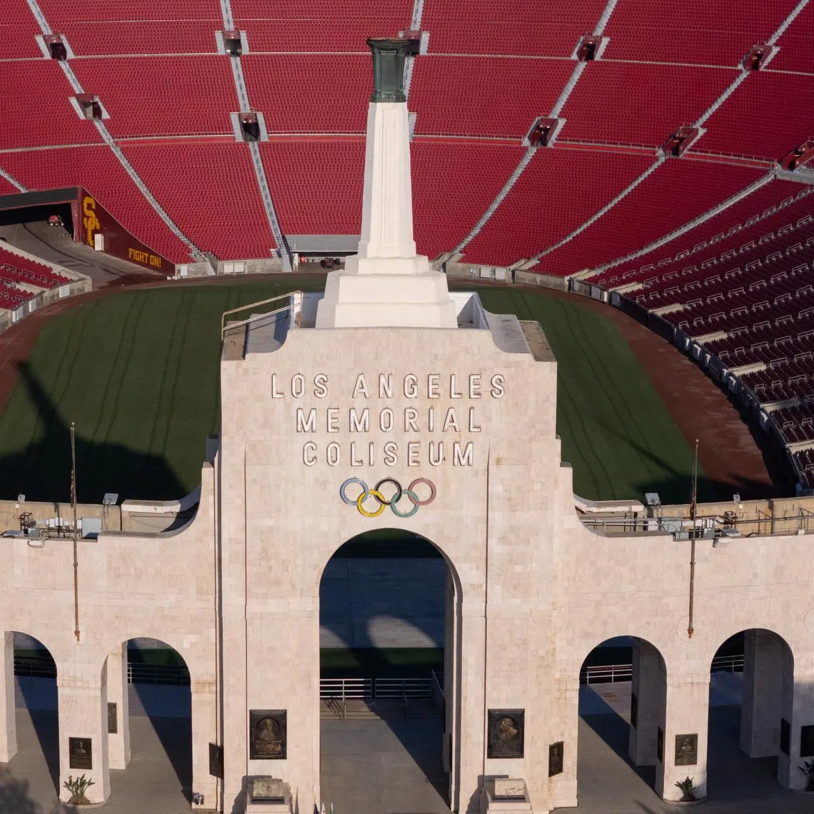 A drone view of Los Angeles Coliseum, as it was announced it will host the opening ceremonies of the 2028 Olympics along with SoFi Stadium in a dual event, closing ceremony, and host the opening of the Paralympic Games in 2028, making it the first facility to host events for 3 Olympic Games in Los Angeles, California, U.S., May 8, 2025. REUTERS/Mike Blake