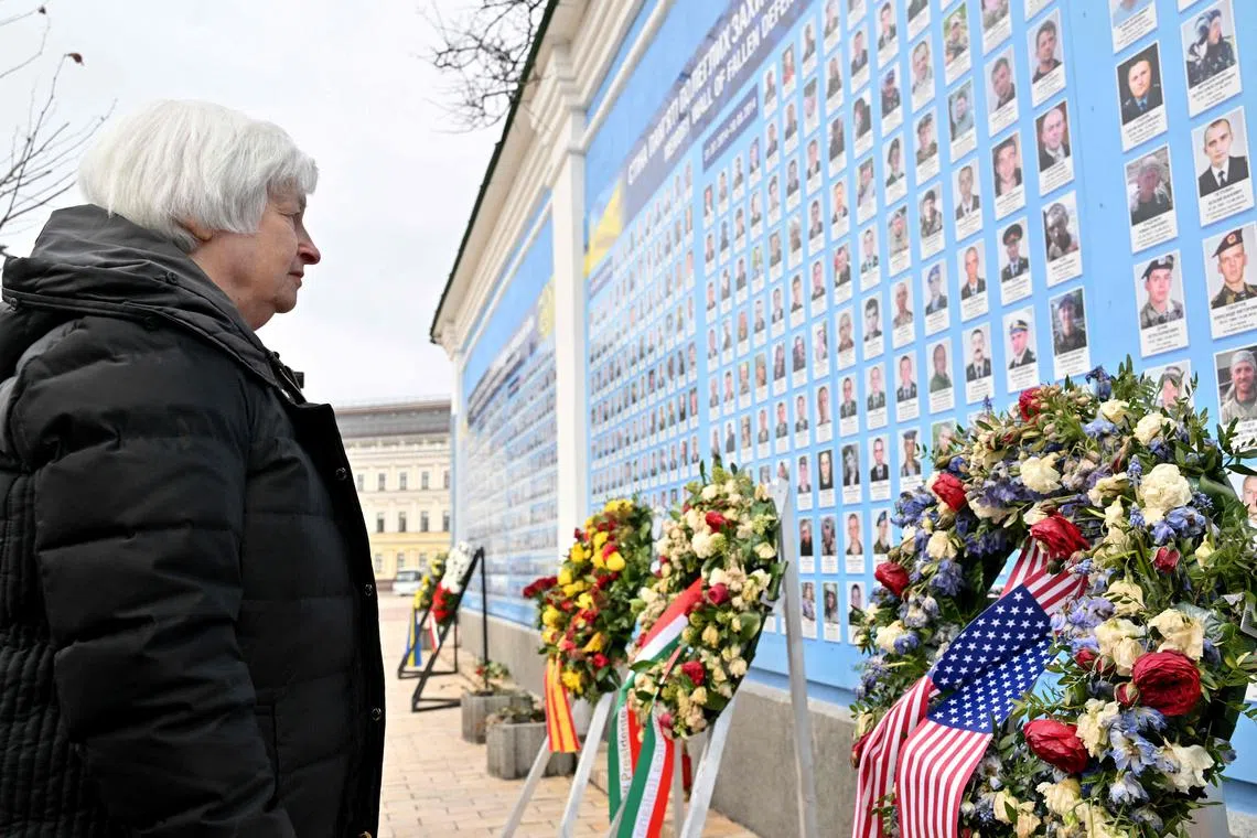 US Secretary of the Treasury Janet Yellen pays her respect at a Memory Wall of Fallen Defenders of Ukraine in the Russian-Ukrainian War.