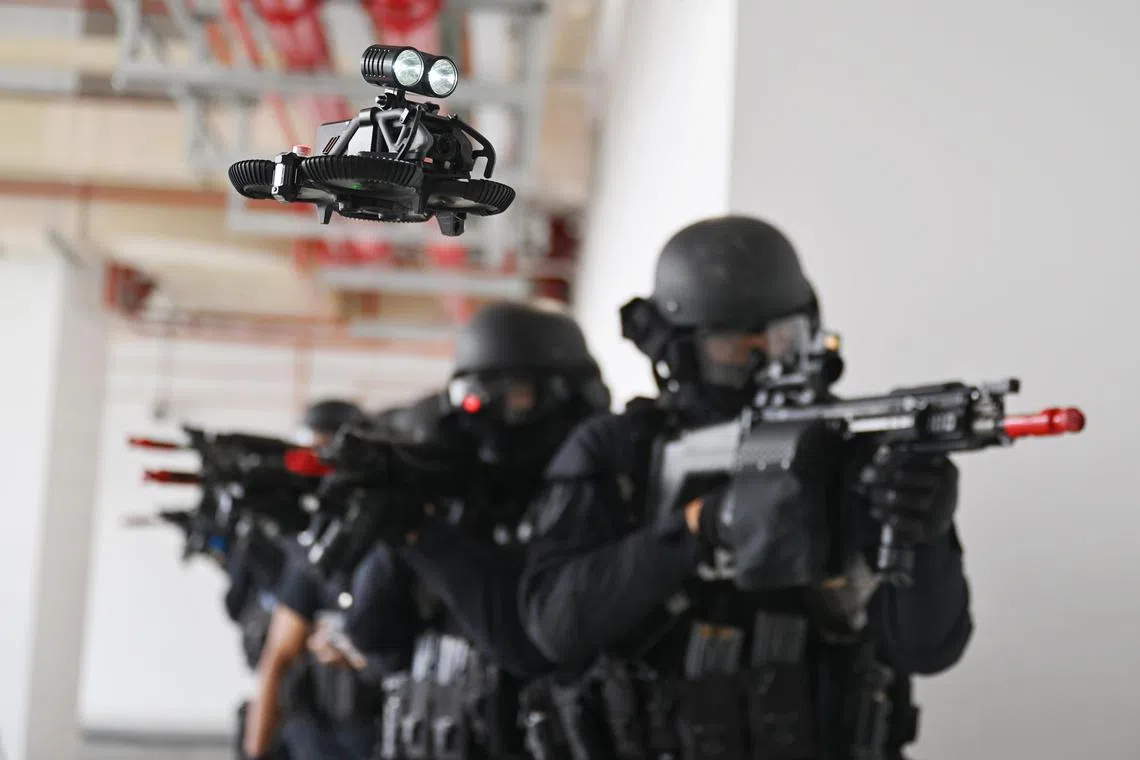 ST20240325_202470065093/ajsoc25/Andrew Wong/Azmi Athni//

*This will be embargoed until 27 March, 5pm

A simulation of how the First-Person-View (FPV) drone is used as a front scout to complement the Armed Strike Team (AST) during police operations at the Home Team Tactical Centre on Mar 25. 

ST PHOTO: AZMI ATHNI