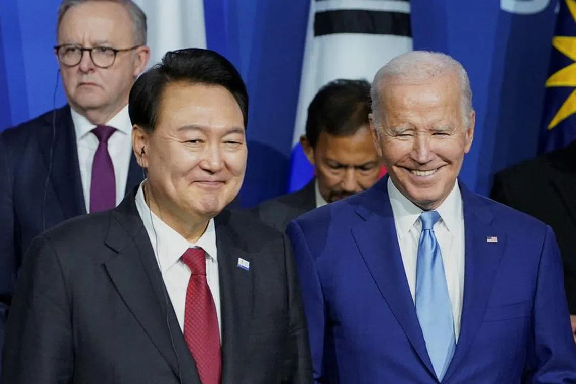 US President Joe Biden and South Korea's President Yoon Suk Yeol smile during an Indo-Pacific Economic Framework event at the Asia-Pacific Economic Cooperation (APEC) summit in San Francisco, California, U.S., November 16, 2023. REUTERS/Kevin Lamarque/File Photo