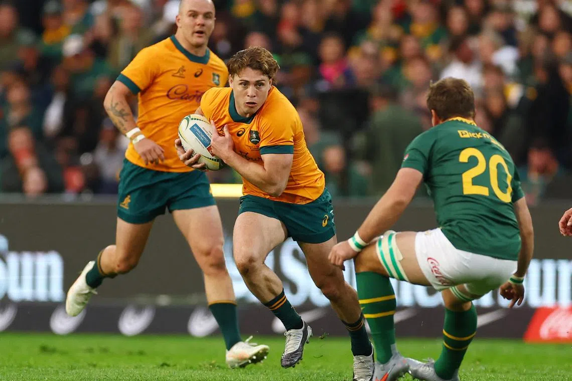 FILE PHOTO: Rugby Union - Rugby Championship - South Africa v Australia - Ellis Park, Johannesburg, South Africa - August 16, 2025 Australia's James O'Connor in action with South Africa's Kwagga Smith REUTERS/Siphiwe Sibeko/File photo