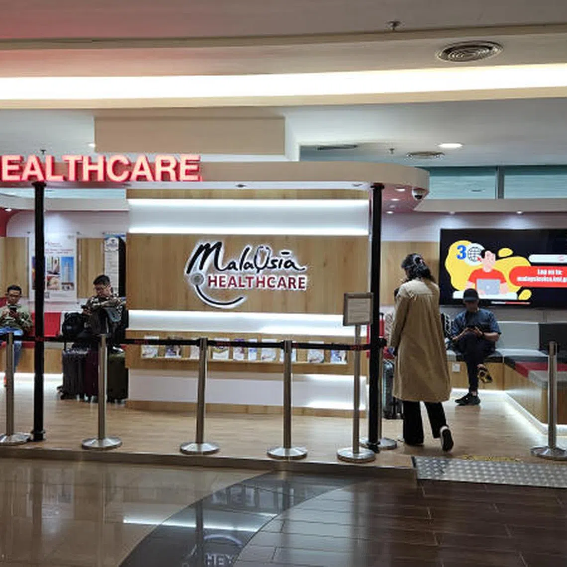 A booth set up by the Malaysia Healthcare Travel Council at Penang International Airport to welcome inbound travellers seeking medical treatment. There are 35 direct flights every week from Medan to Penang.