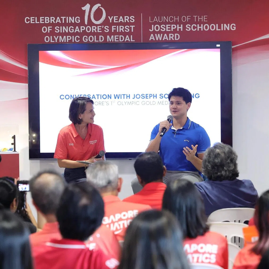 Former national swimmer Joseph Schooling and host Colette Wong at an event at OCBC Aquatic Centre on Aug 12 commemorating the 10th anniversary of Schooling’s Olympic gold-winning feat.